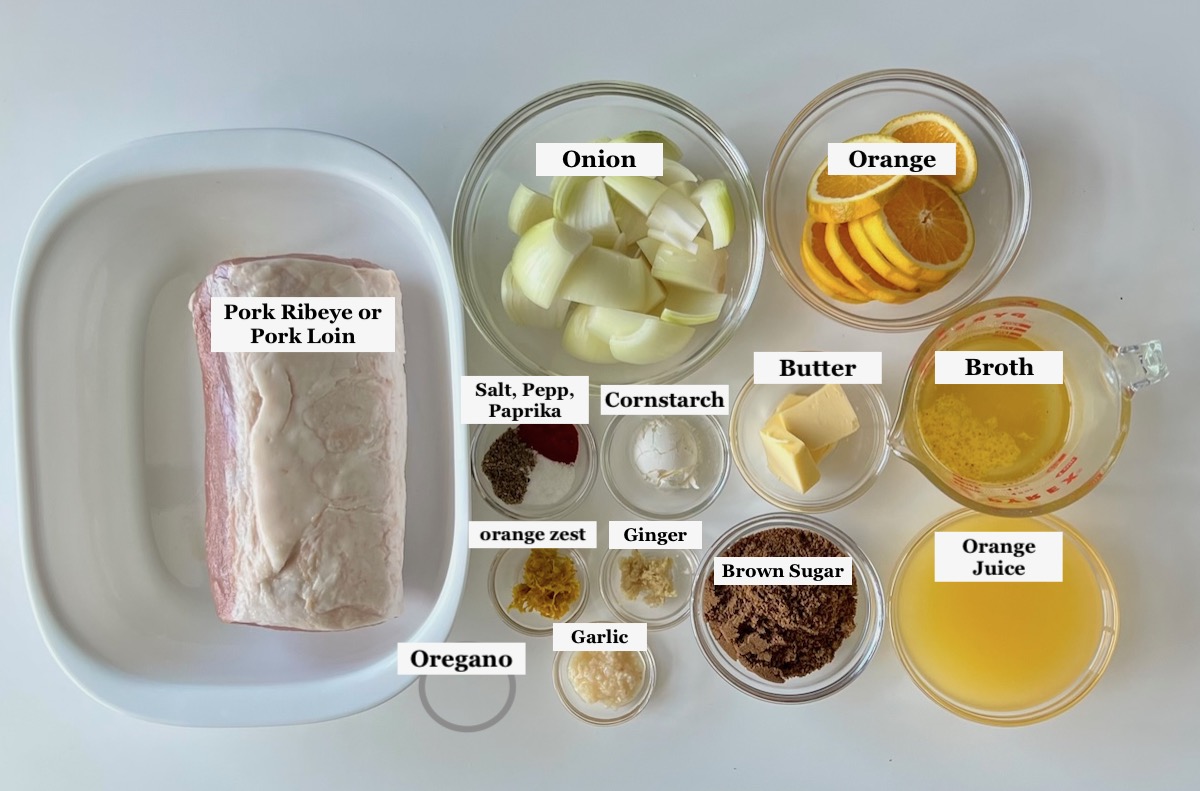 Ingredients chopped, measured, and prepared in bowls and labeled on counter for Pork Ribeye Roast recipe.
