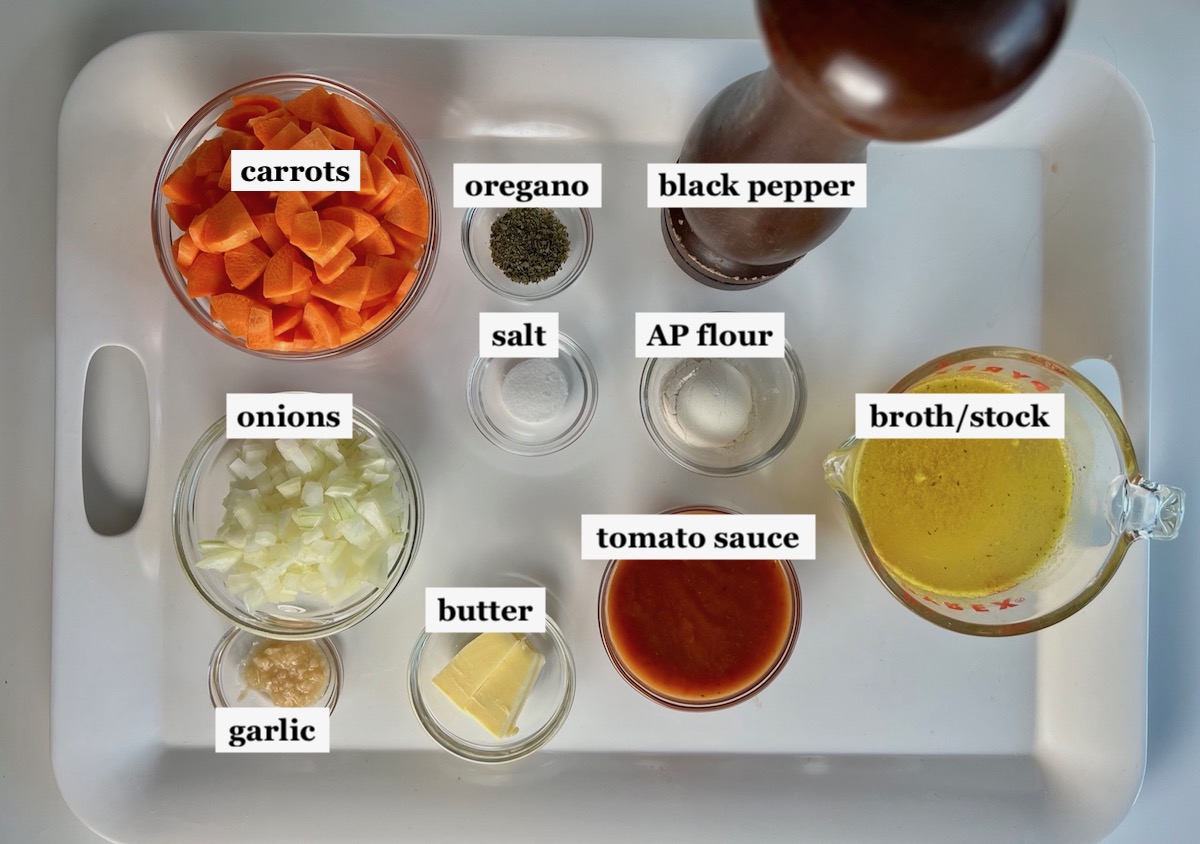 Ingredients prepped and measured out in bowls for Carrot Sauce recipe.