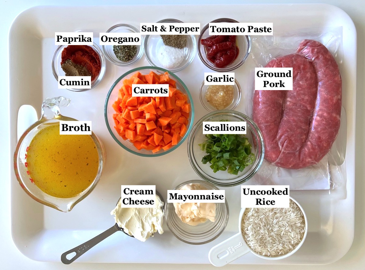Ingredients prepped and measured out in bowls for the Ground Pork Slow Cooker Casserole recipe.